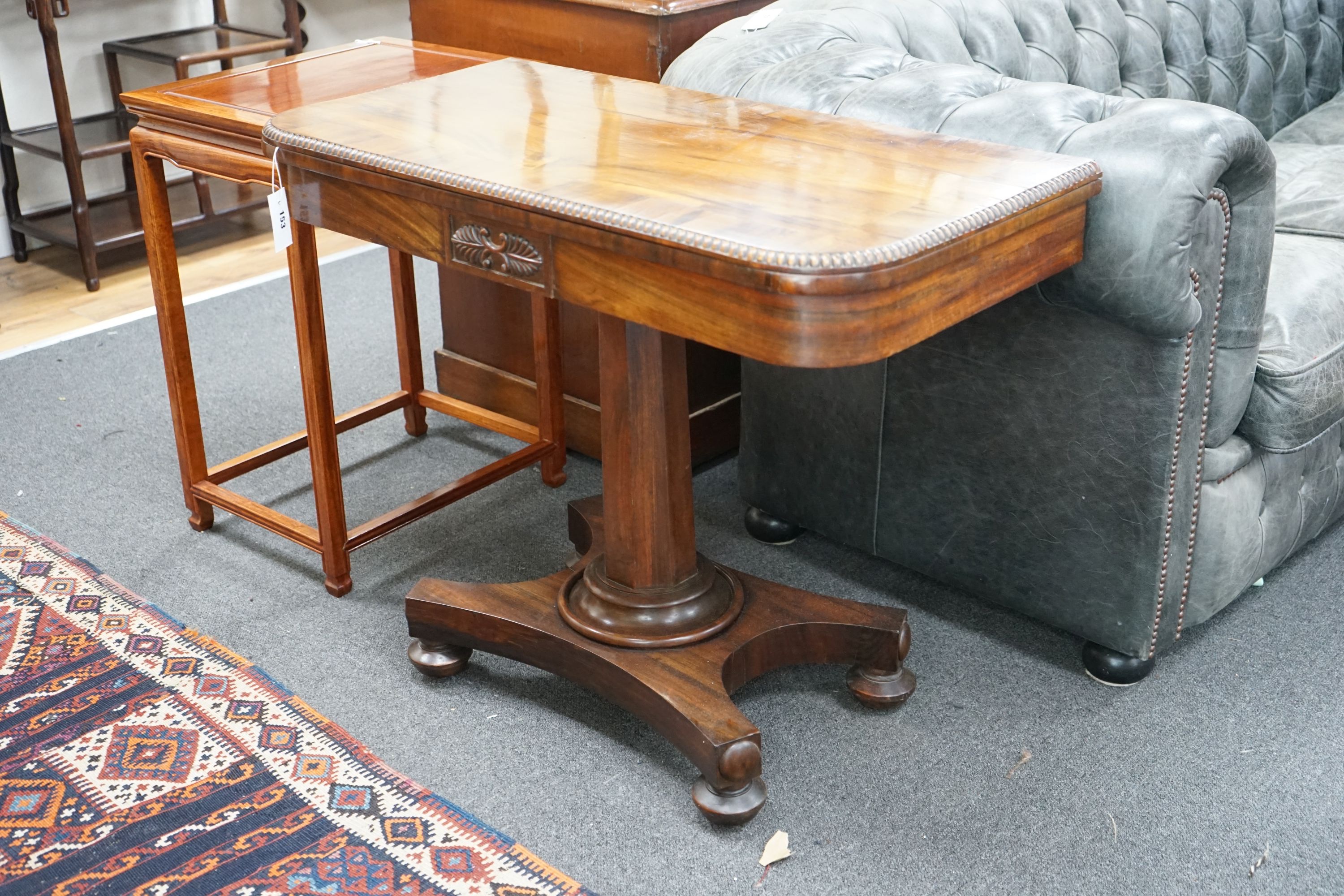 A Regency Gonçalo Alves rectangular folding card table, width 90cm, depth 45cm, height 73cm